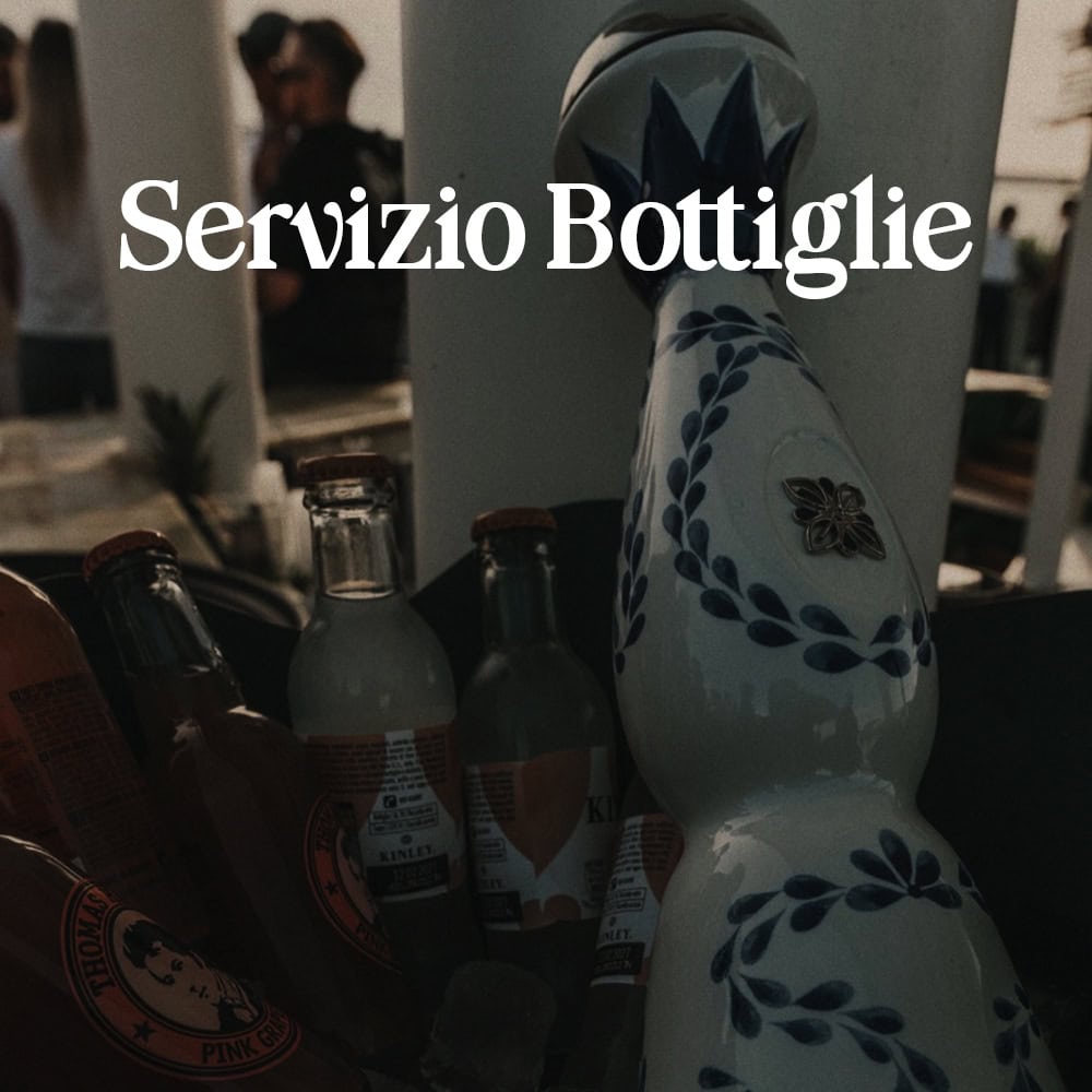 Bottle service at Eclipse Sound Panama with decorative ceramic figure.